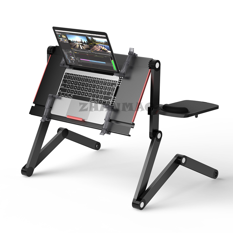 Liggend plat op het bed, lapto - Desk Setup Laptop recensie en prijs